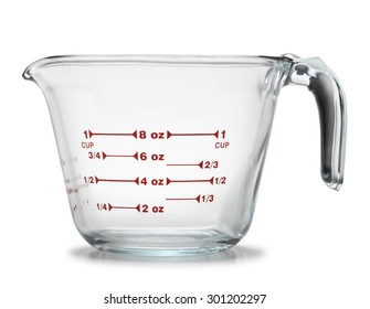 Glass measuring cup isolated on white background.