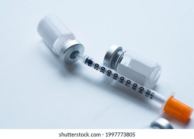 Glass Medicine Vial And Pills, Glass Medicine Vial And Botox Syringe, Vaccination And Immunization