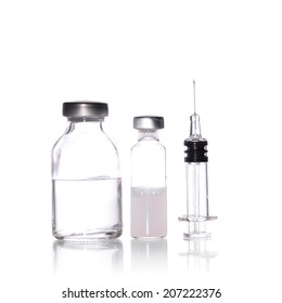 Glass Medicine Vial And Glass Syringe  For Injecting Medicine On A White Background