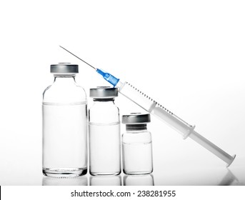 Glass Medicine Vials and botox hualuronic collagen and flu syringe.