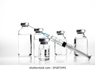 Glass Medicine Vials And Botox Hualuronic Collagen Or Flu Syringe.