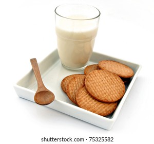 Glass Of Milk And Cookies Isolated On White Background