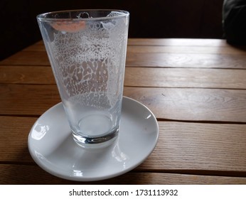 Glass Of Milk Finished Drinking, Red Lipstick Mark On A Glass