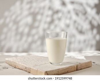 Glass Of Milk On A White Table