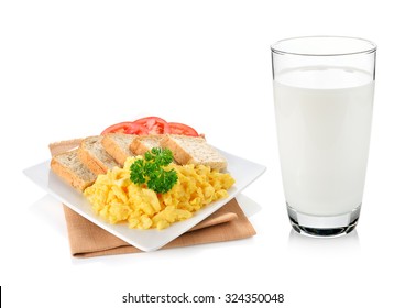 Glass Of Milk And Scrambled Eggs Isolated On White.