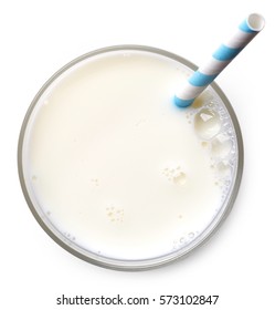 Glass of milk with straw isolated on white background. From top view