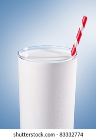 Glass Of Milk With Striped Red Straw