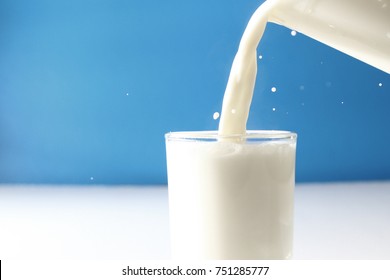 Glass of milk / Milk is a white liquid produced by the mammary glands of mammals - Shutterstock ID 751285777