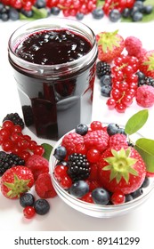 A Glass Of Mixed Berry Jam With Strawberries, Bilberries, Red Currants, Raspberries And Blackberries