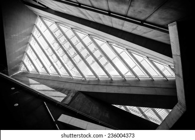 Glass Office Buildings In Wide Angle View.Modern Conceptual High Tech Building With Abstract Roof And Stairs