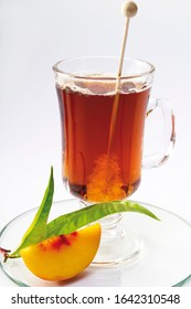 Glass Of Peach Tea And Rock Candy