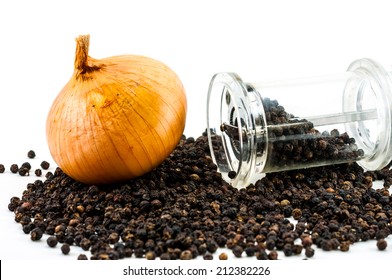 Glass Pepper Grinder And Fresh Onion With Dried Whole Peppercorn On White Background