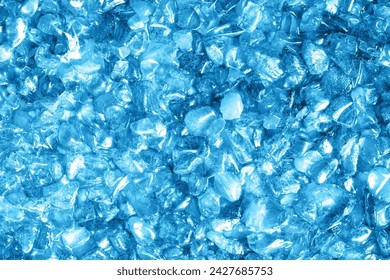 Glass pieces texture. Broken glass pattern. Shattered crystal glass frame. Decorative blue wall. Artistic effect background. Special decoration effect. Blue crystal texture.