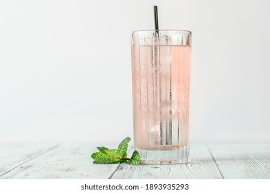 Glass Of Pink Gin And Tonic Cocktail