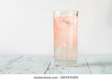 Glass Of Pink Gin And Tonic Cocktail