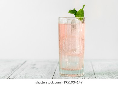 Glass Of Pink Gin And Tonic Cocktail