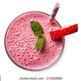 Glass of pink strawberry milkshake or cocktail isolated on white background. From top view