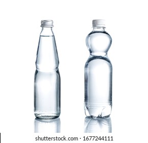 Glass And Plastic Water Bottles Isolated On White Background