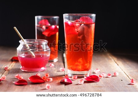 glass of Pomegranate juice cocktail mixed with rose and lime