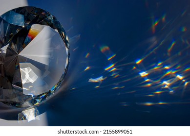 Glass Prism In The Form Of A Diamond With Polished Edges And Light Spots Passing Through Them