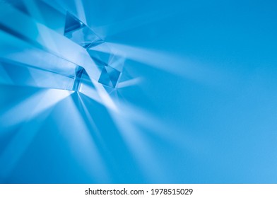 Glass Prisms And Cubes With Color Spectrum Rays. Abstract Background With Reflection And Refraction Of Light. Shadow And Rays Of Natural Light Effects.