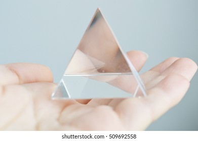 Glass Pyramid In Hand