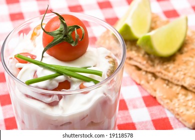 Glass Of Quark, Yogurt And Chopped Tomatoes