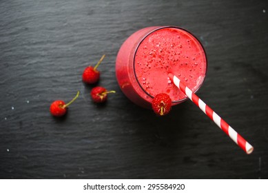 Glass With Rasberry Smoothie On The Table, Selective Focus