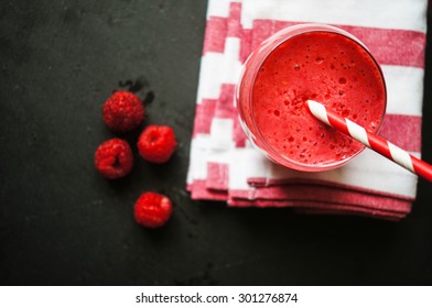 Glass With Rasberry Smoothie On The Table, Selective Focus