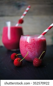 Glass With Rasberry Smoothie On The Table, Selective Focus