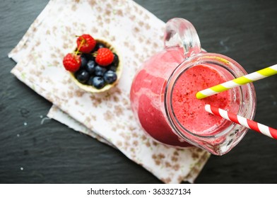 Glass With Rasberry Smoothie On The Table, Selective Focus