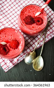 Glass With Rasberry Smoothie On The Table, Selective Focus