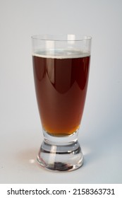 A Glass Of Red Ale Beer Isolated On A Gray Background