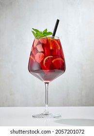 glass of red sangria on restaurant table