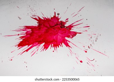 A glass of red wine accidentally dropped to the floor and spilling the content - Shutterstock ID 2253500065