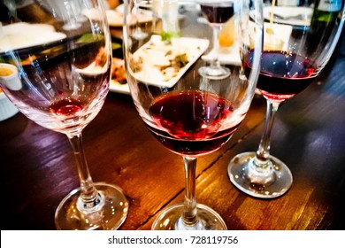 Glass Of Red Wine After Wine Testing. Choose The Best Taste For Red Meat Food In Dinner Party. Selected Focus.