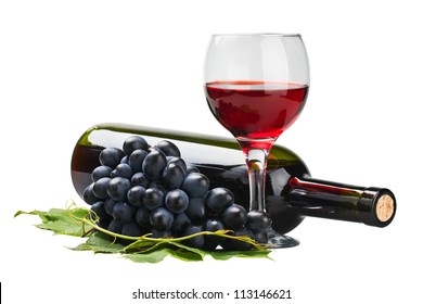 glass of red wine with bottle and grape over white