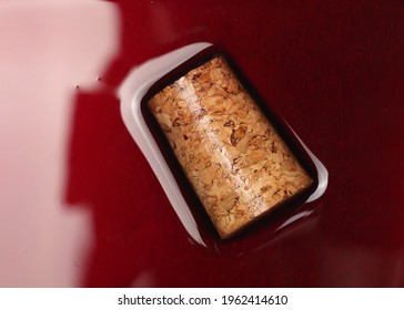 Glass red wine with cork isolated on white background, top view - Powered by Shutterstock