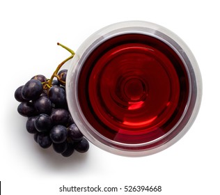 Glass Of Red Wine And Grapes Isolated On White Background From Top View