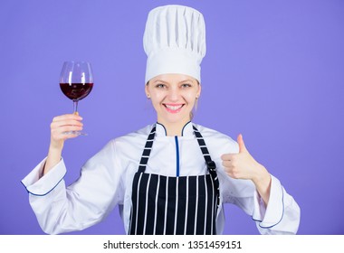 A Glass Of Red Wine Is Okay. Happy Wine Expert Showing Thumbs Up Gesture With Wine Glass In Hand. Professional Sommelier Smiling With Drinking Glass. Smiling Woman Holding Wine Glass By Stem.