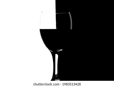 Glass Of Red Wine On Abstract Black And White Background