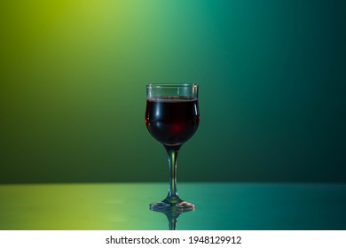 A glass of red wine on beautiful background. Raw photo