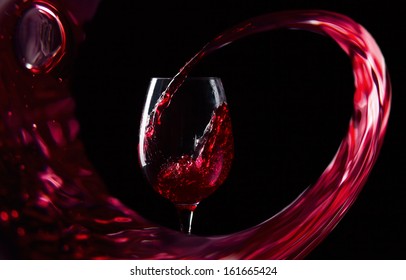  Glass With Red Wine On A Black Background