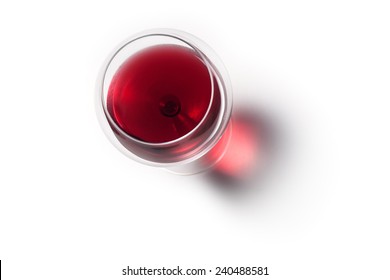 Glass of red wine with shadow.Top view 