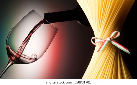 Glass With Red Wine And Spaghetti With Italian Flag