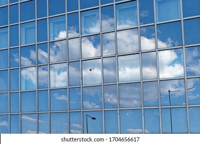 glass reflections on office building in Paris suburb