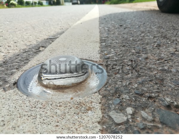 glass road marking reflectors. \
SIGLITE 360 degree\
tempered glass road marking reflectors.\
Raised pavement marker\
safety object on road.