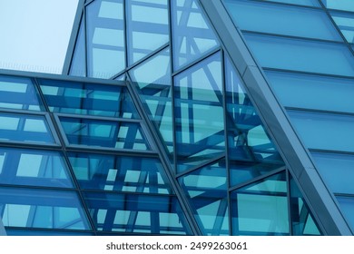 Glass roof in modern commercial building, greenhouse. Metal frame structure. Modern architecture. Fragment. architectural background - Powered by Shutterstock