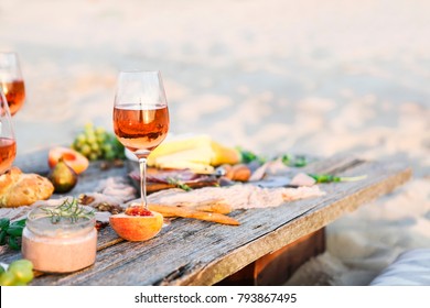 Glass Of Rose Wine On Rustic Table. Food And Drink Background