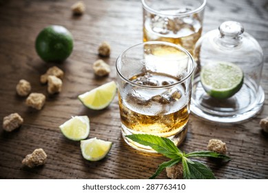 Glass Of Rum On The Wooden Background